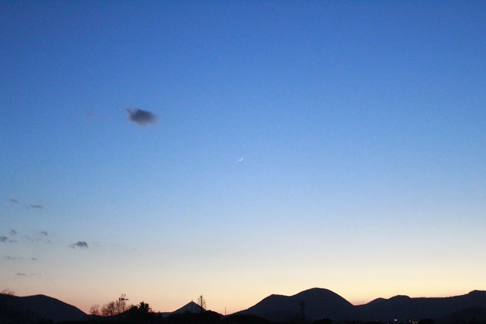 a distant object is seen in the sky