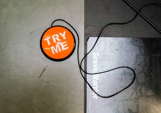 a picture of a tag that says try me on it