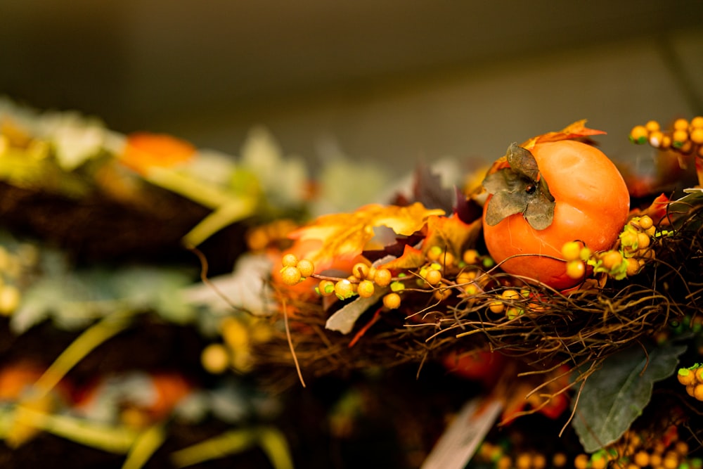 a close up of a bunch of fake pumpkins