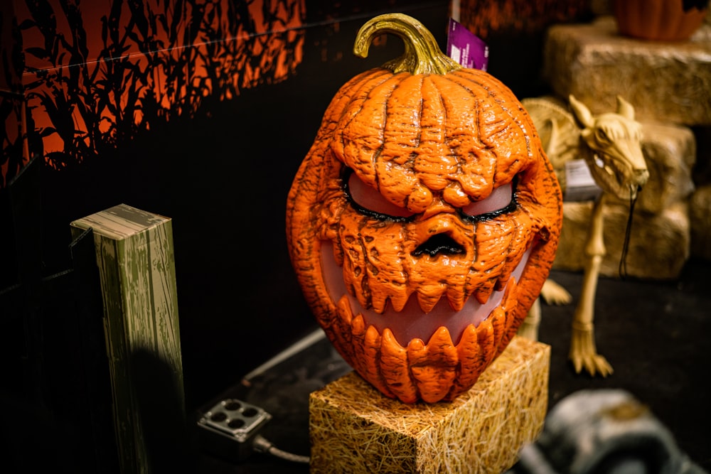 a pumpkin carved to look like a scary face