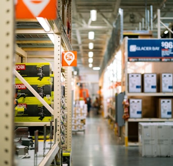 a store aisle filled with lots of yellow and red items