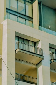 a tall building with balconies and balconies on it