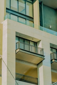 a tall building with balconies and balconies on it
