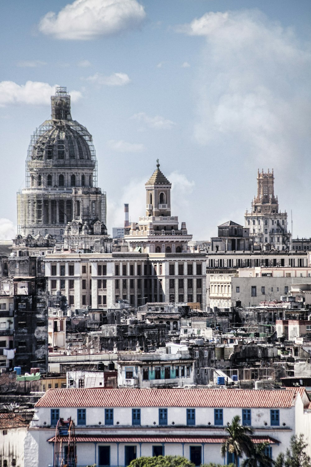 a view of a city with buildings and a dome