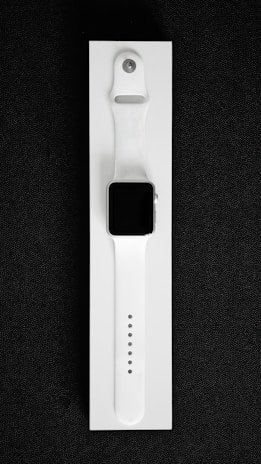 Close-up of the sleek, minimalist posture wearable blending seamlessly under a white shirt.