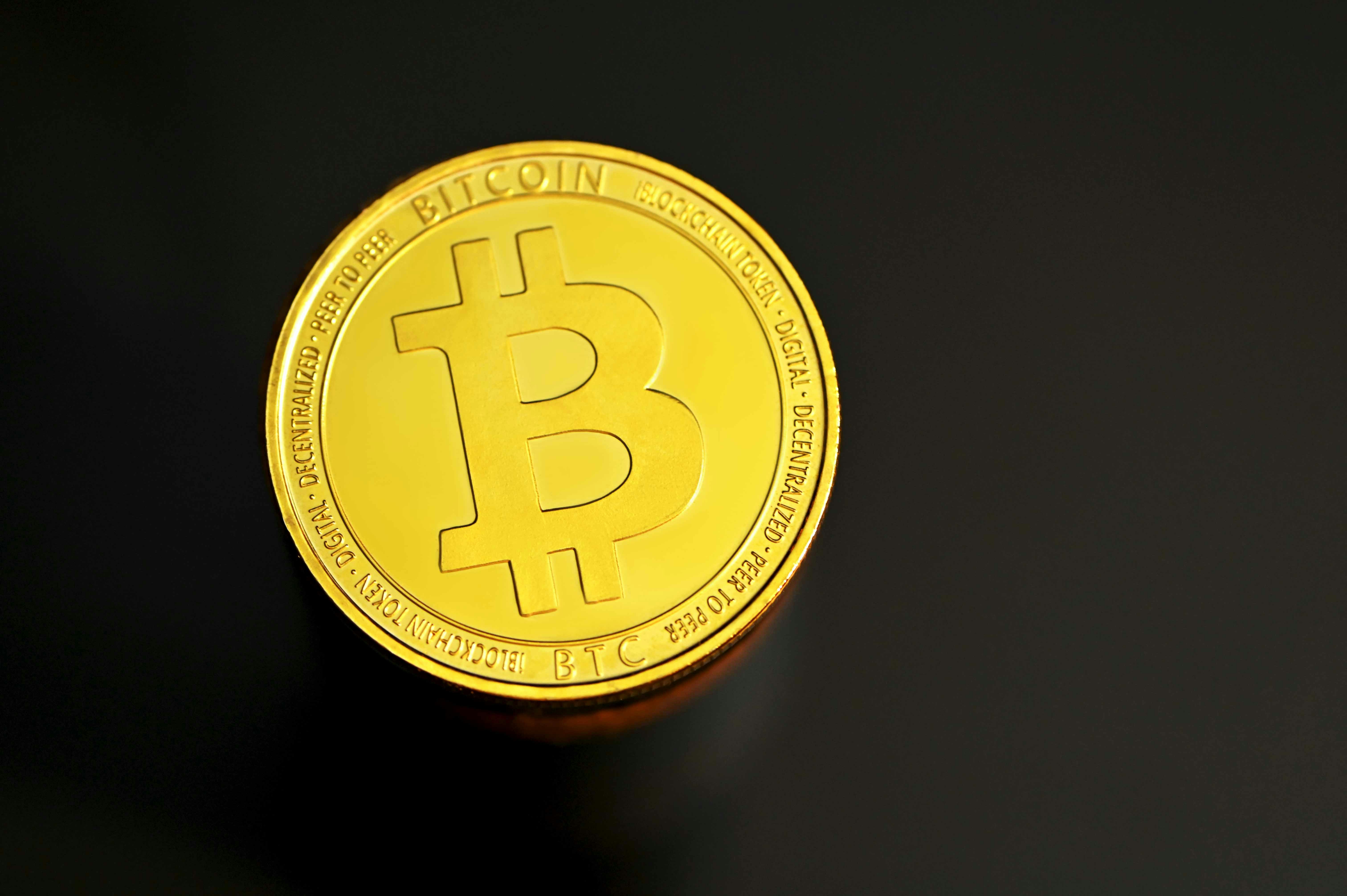 A Bitcoin placed on the floor