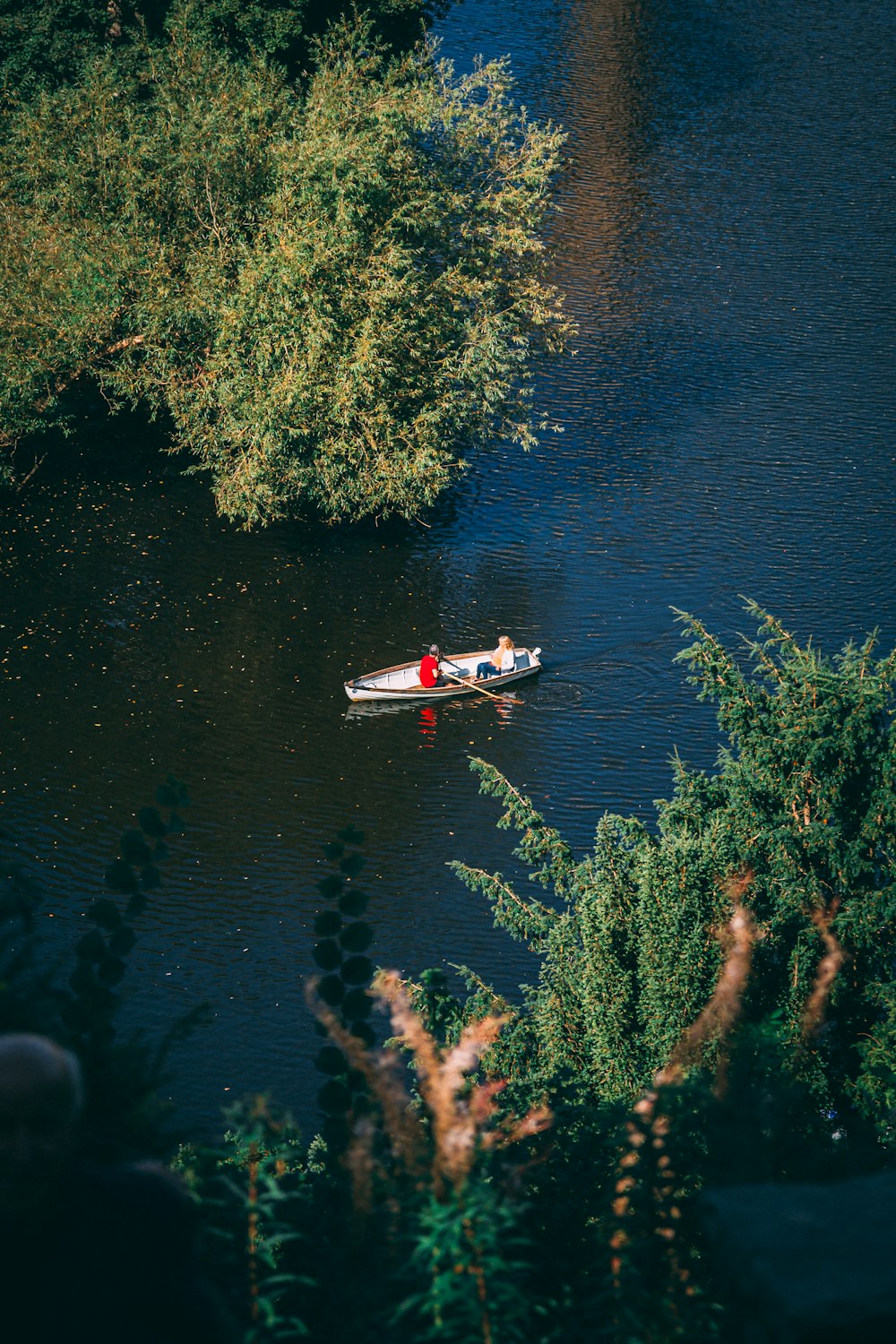 a person in a boat on a body of water