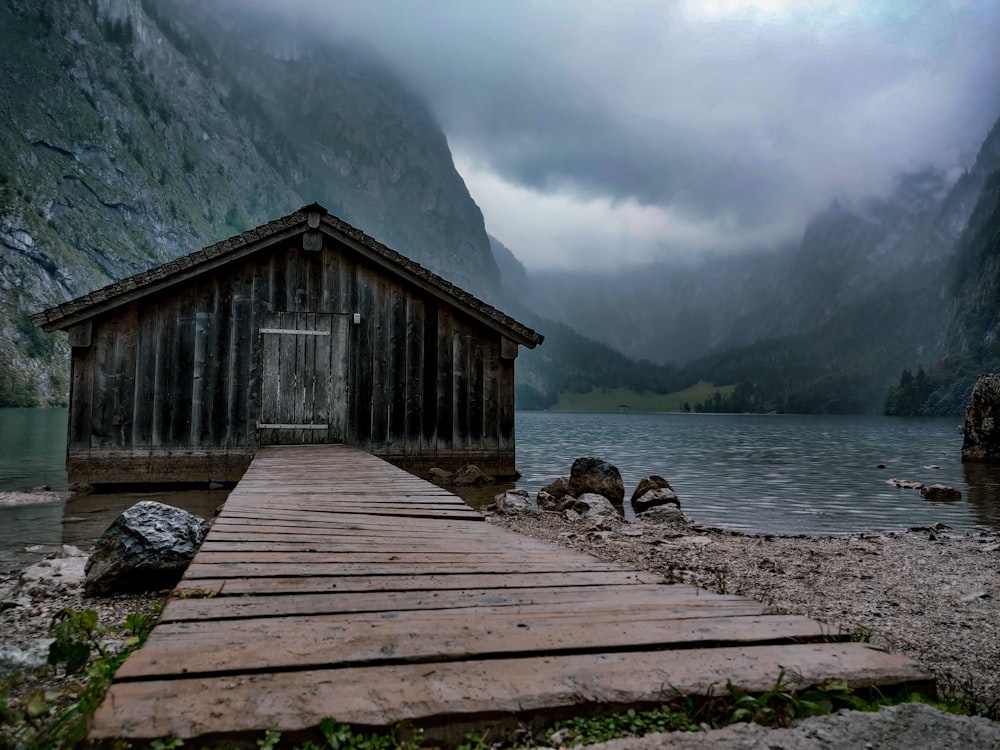 a wooden dock sitting next to a body of water