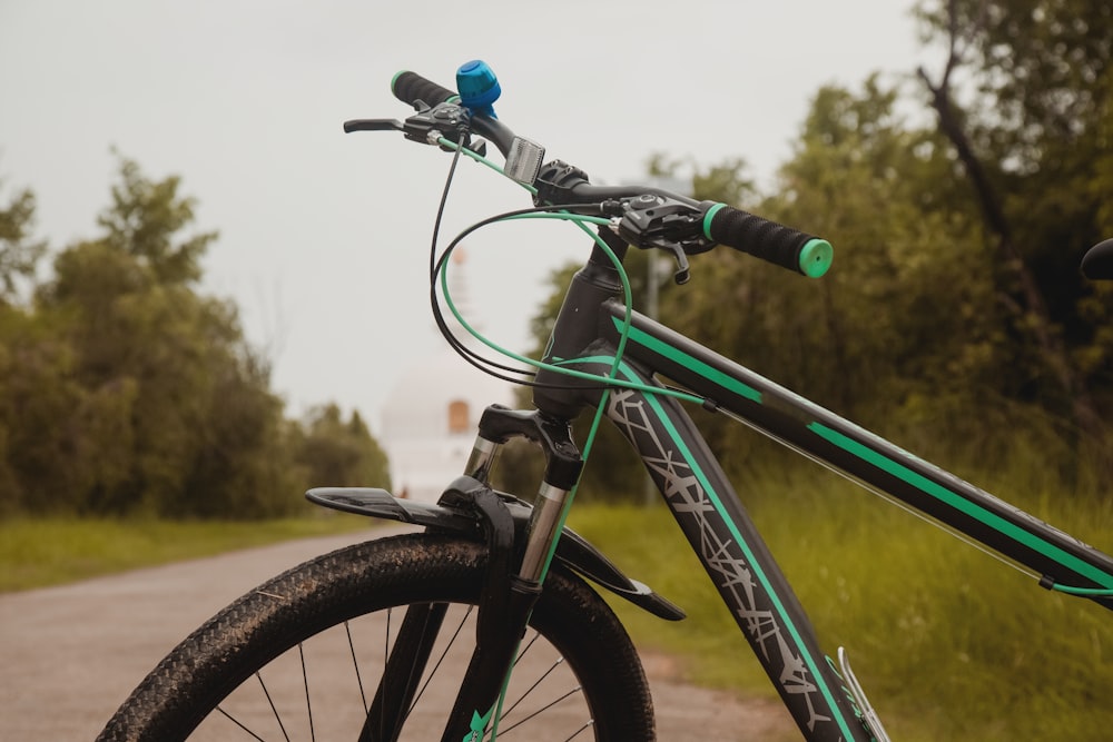 a bicycle parked on the side of a road