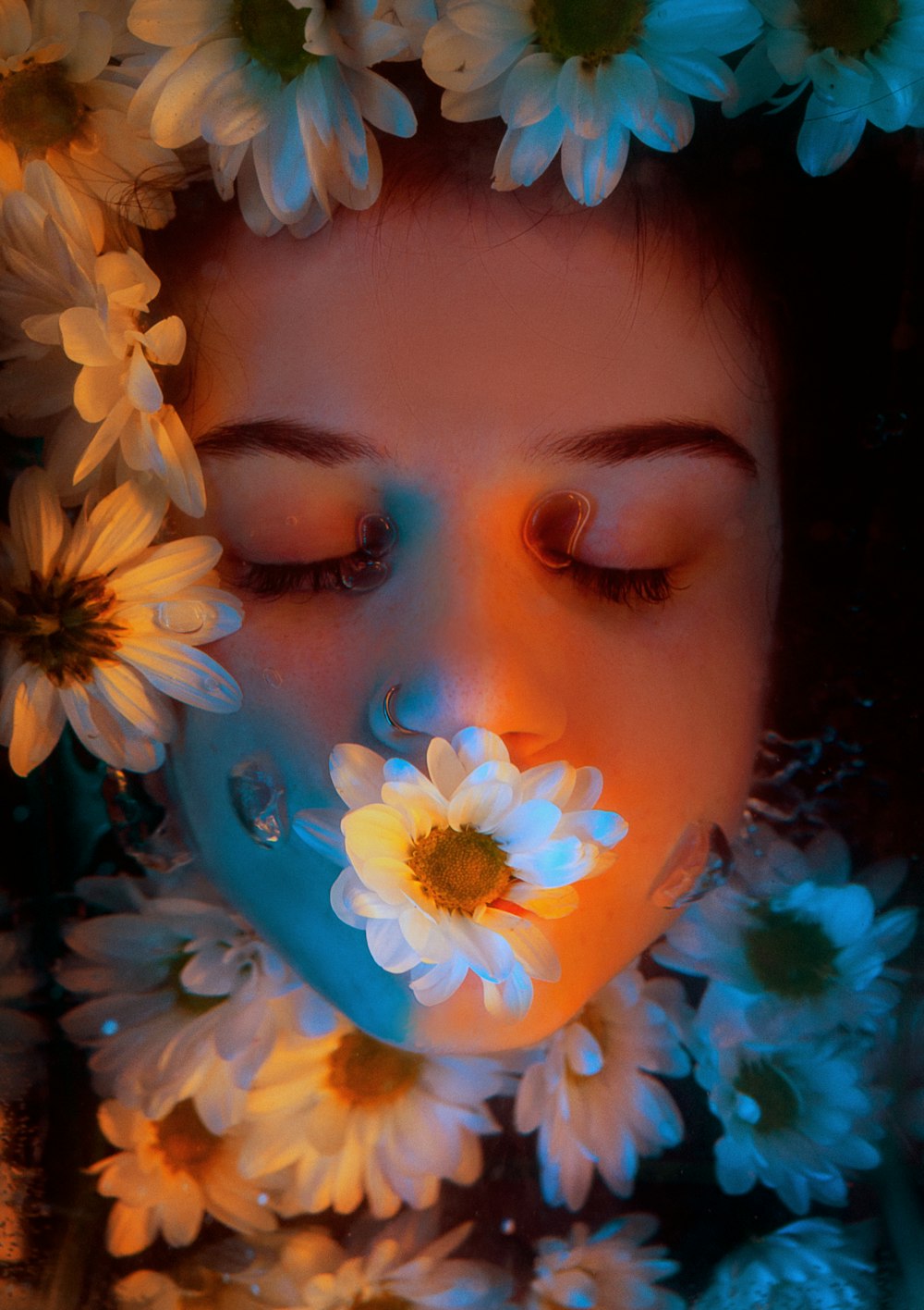 a woman with a flower in her hair