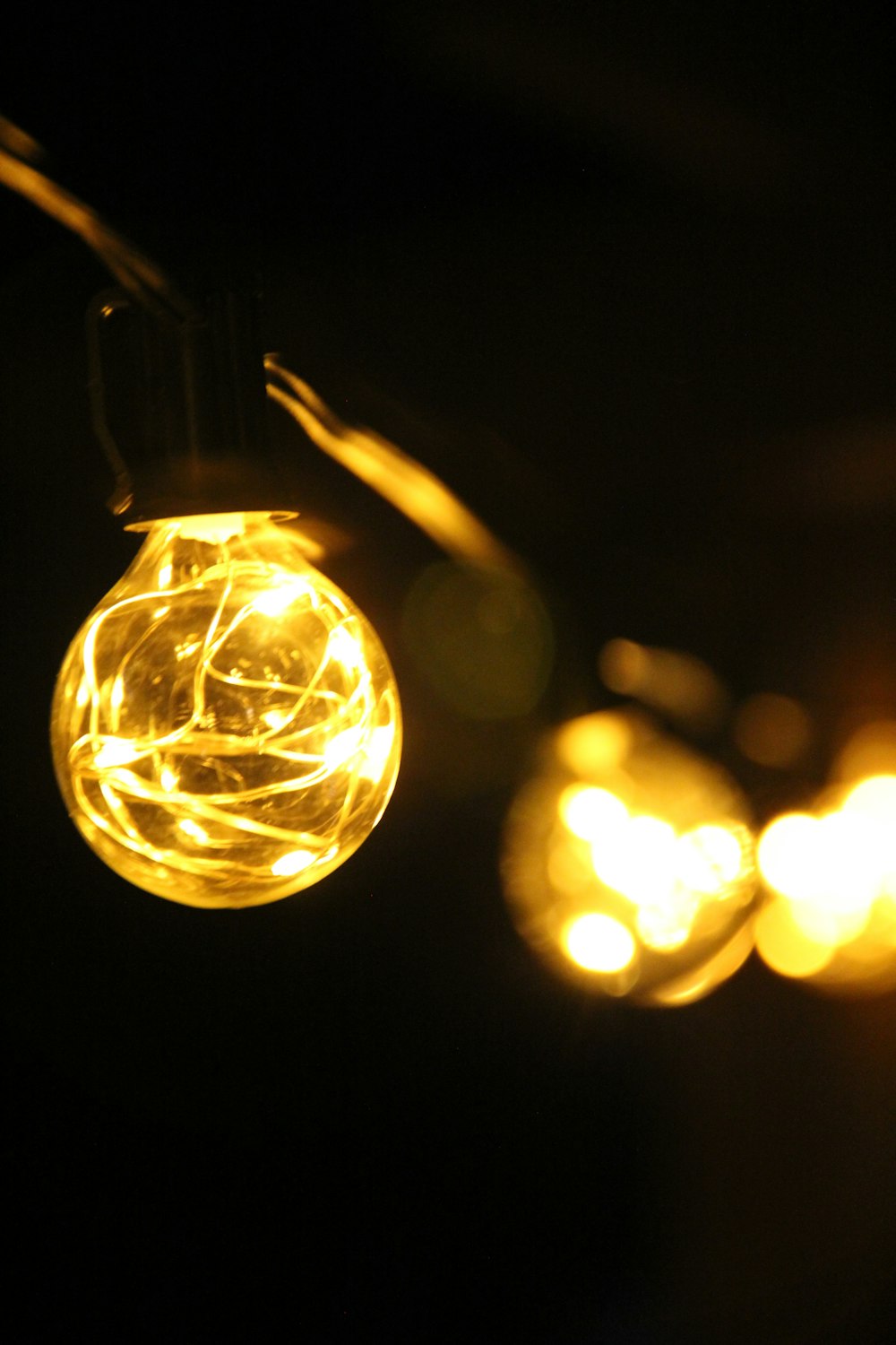 a close up of a string of lights