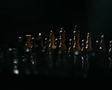 a group of chess pieces sitting on top of a table
