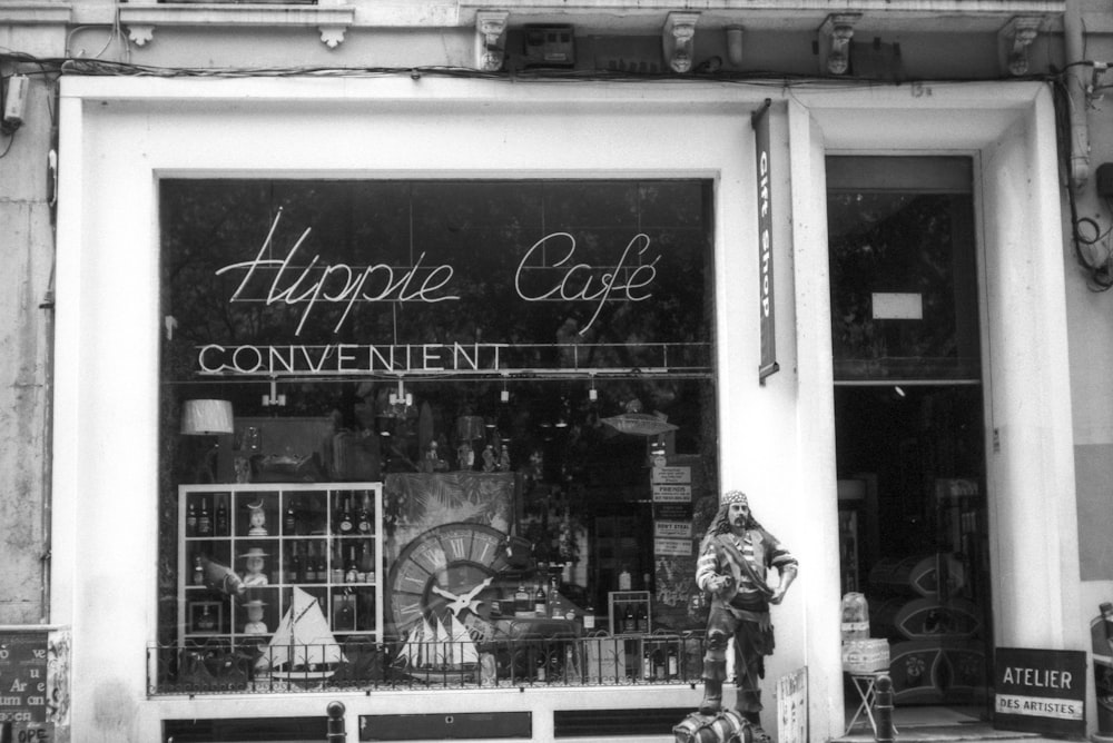 a black and white photo of a store front