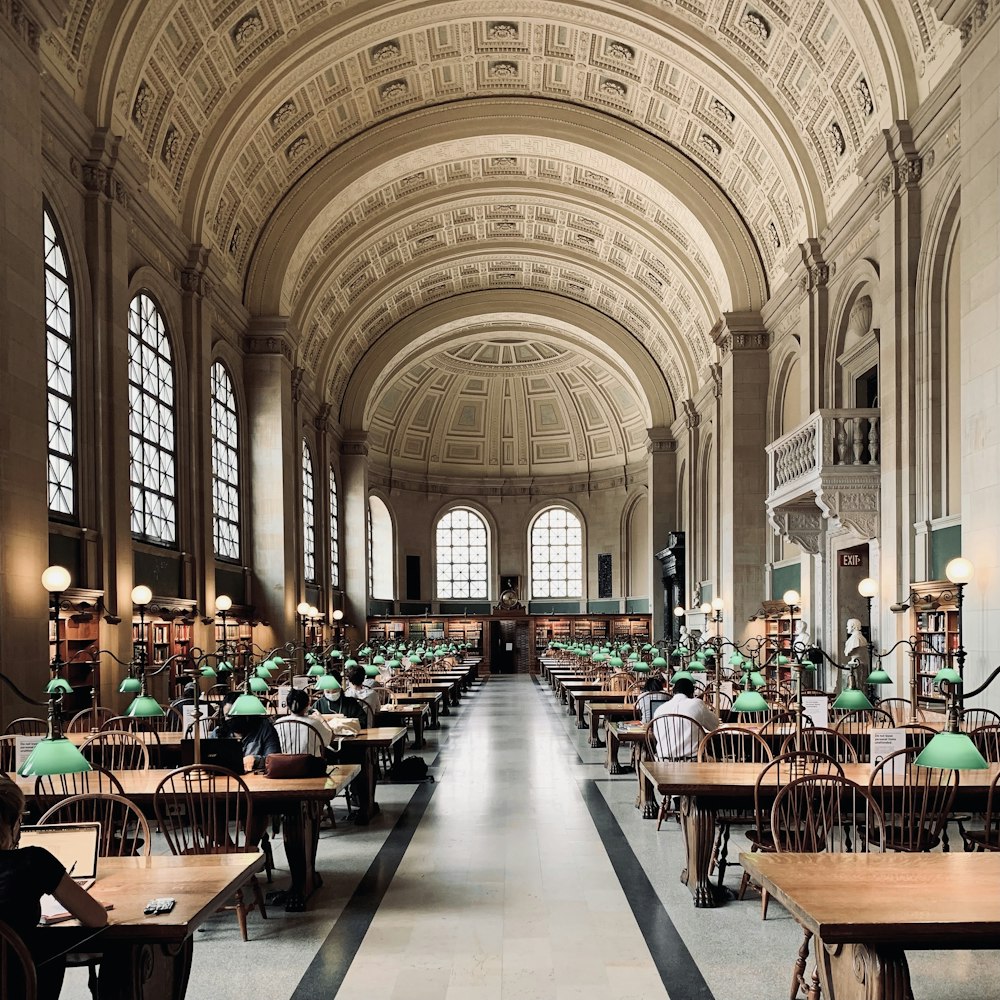 a large room filled with lots of tables and chairs