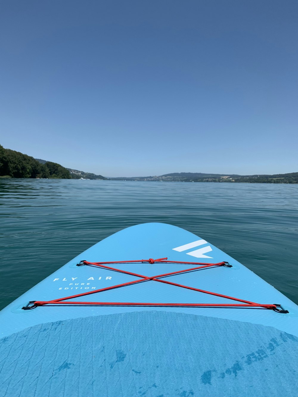 a view from the front of a blue kayak