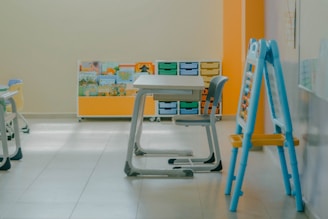 a child's desk and chair in a room
