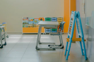 a child's desk and chair in a room