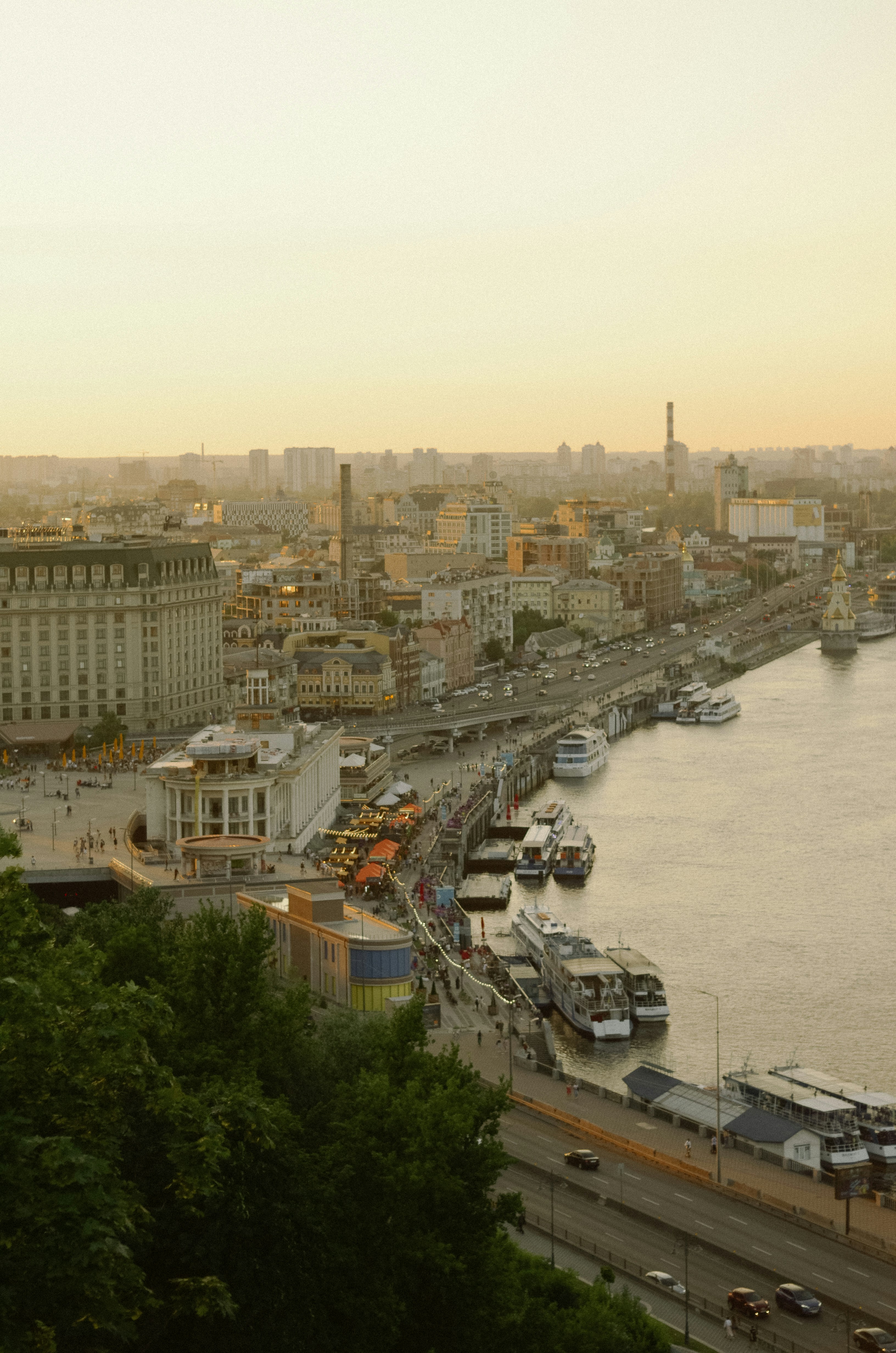 a large long train on a track in the city