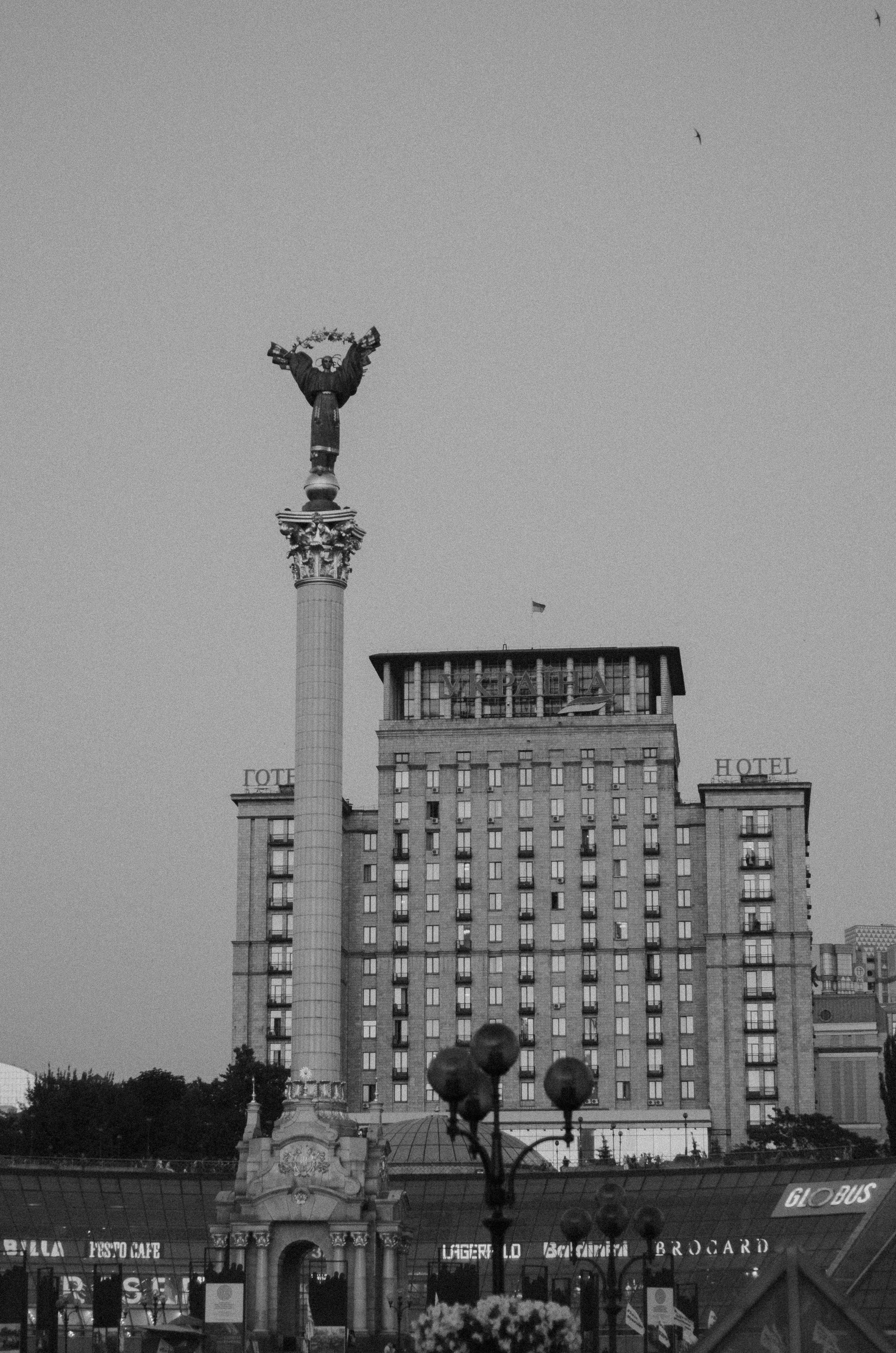 a large clock tower towering over a city