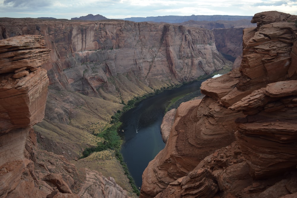 a river in a canyon surrounded by mountains