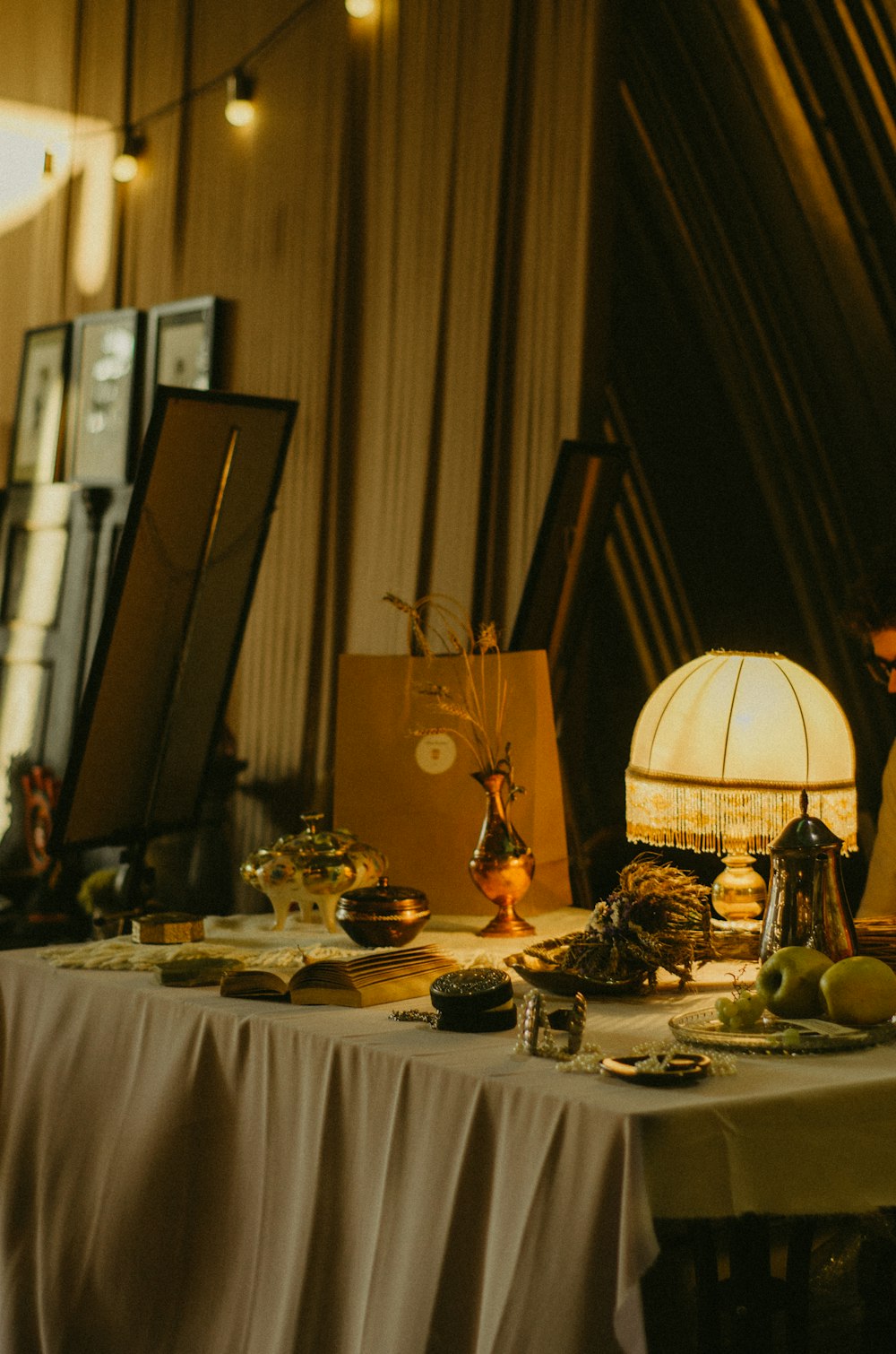 a man sitting at a table with food on it