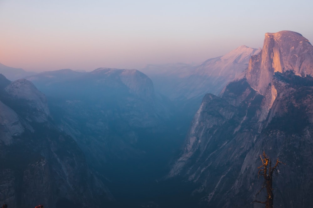 a view of a mountain range from the top of a mountain