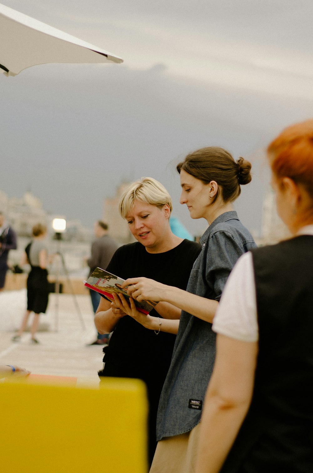 a group of women standing next to each other