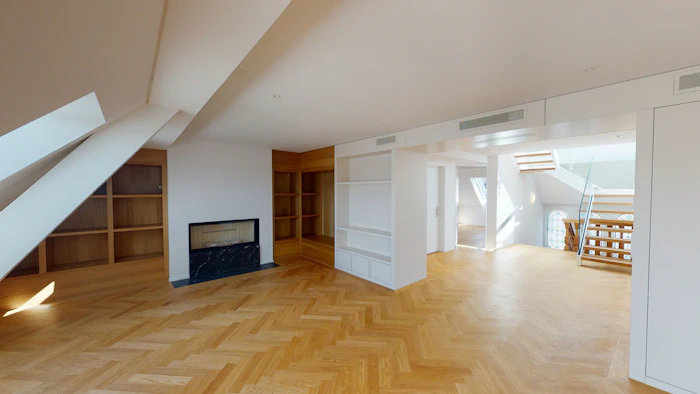 Flooring installer placing hardwood planks row by row