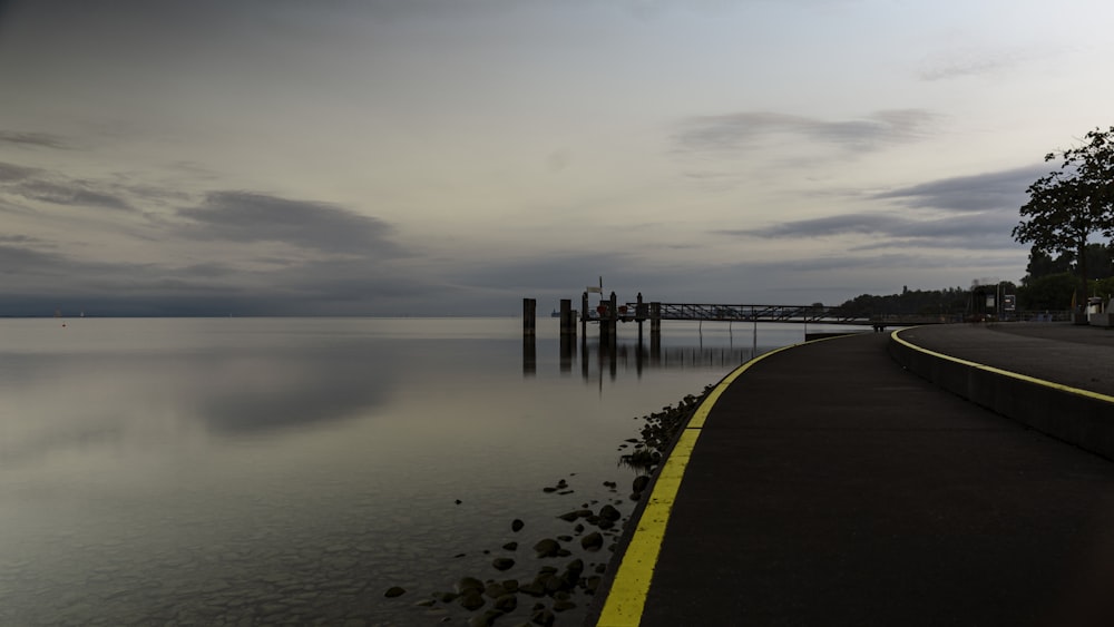 a road that is next to a body of water