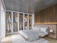 A cozy modern bedroom with elegant oak furniture and warm ambient lighting.