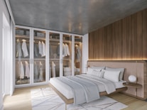 a bedroom with a bed and a closet
