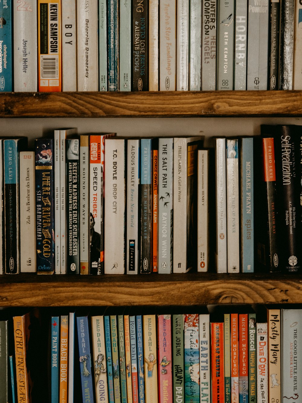 a book shelf filled with lots of books