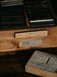 a wooden drawer with a number on it