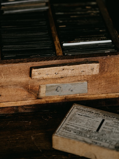 a wooden drawer with a number on it