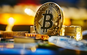 a bitcoin sitting on top of a computer chip