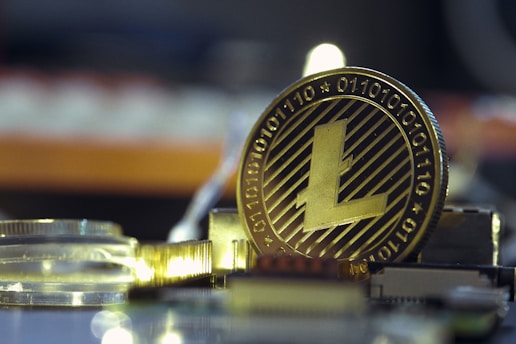 a close up of a bit coin on a table