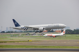a large jetliner taking off from an airport runway