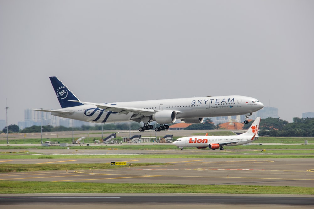 a large jetliner taking off from an airport runway