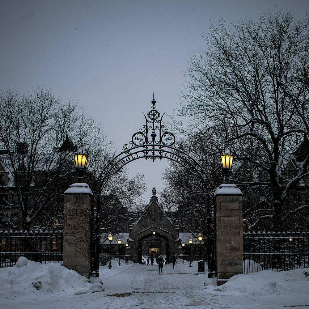 a couple of people that are standing in the snow