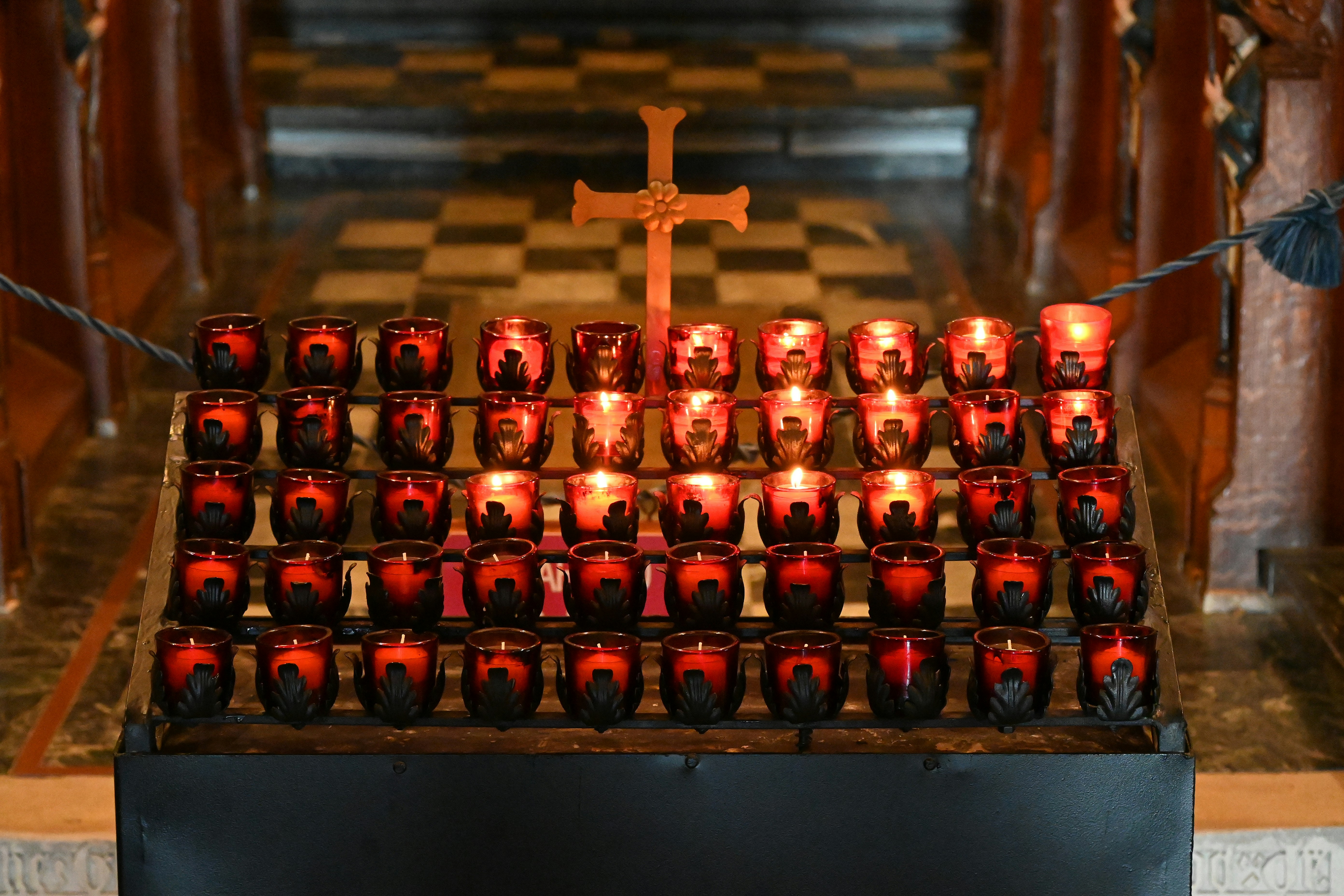 prayer candles inside of a church