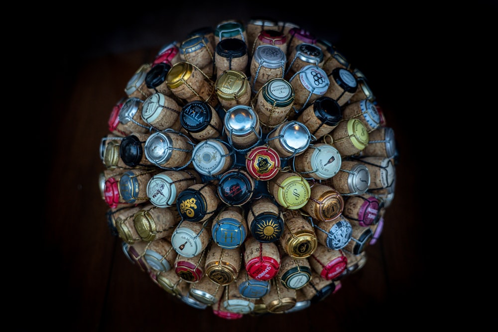 a bunch of wine bottles are arranged in a circle