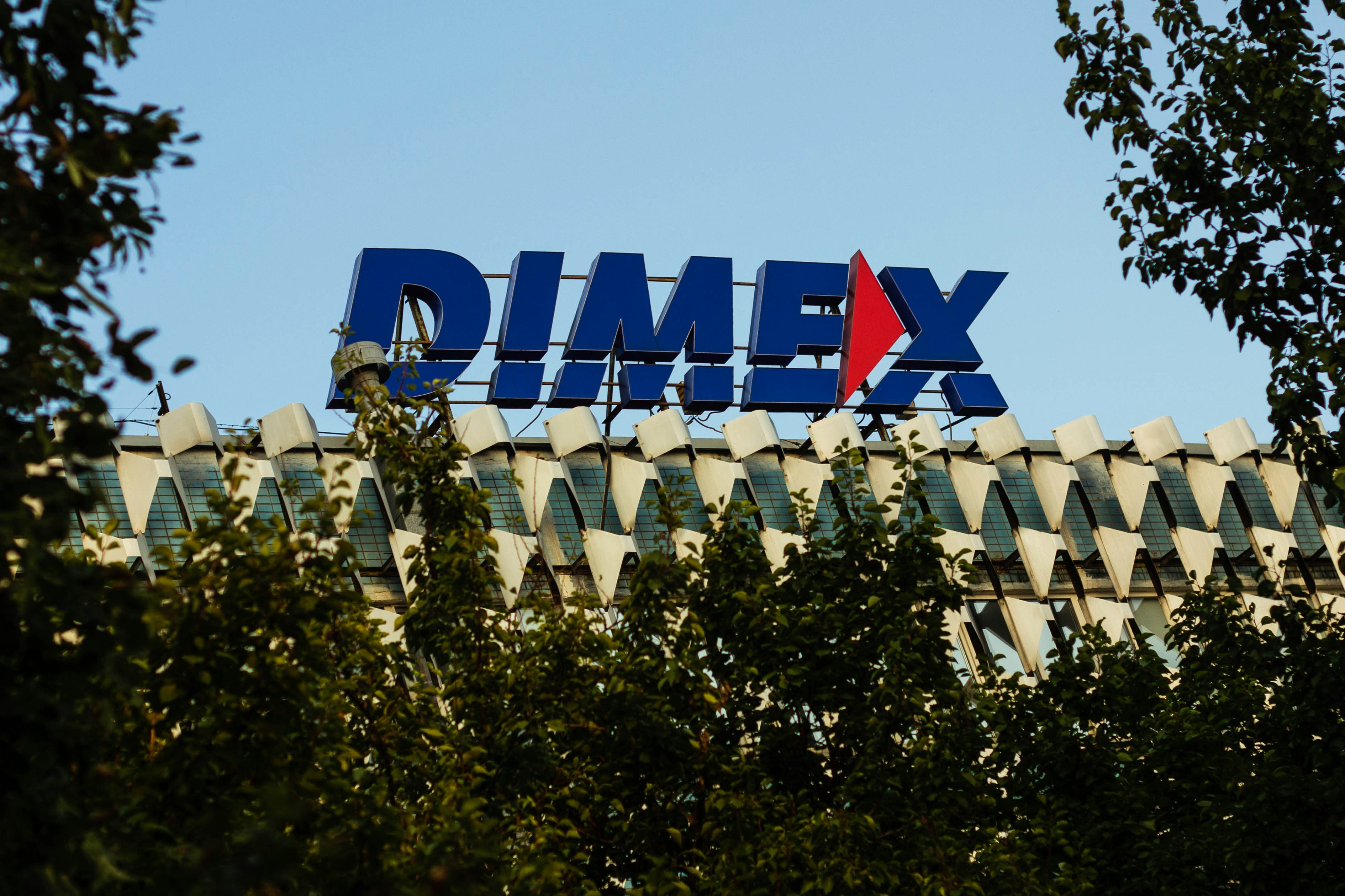 a large sign that is on top of a building