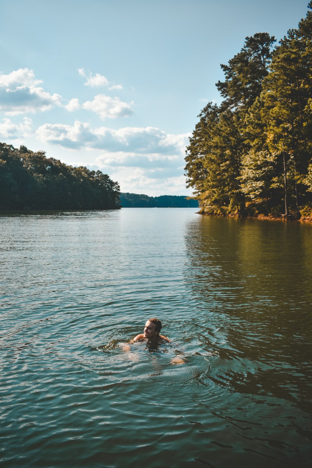 a person swimming in a body of water