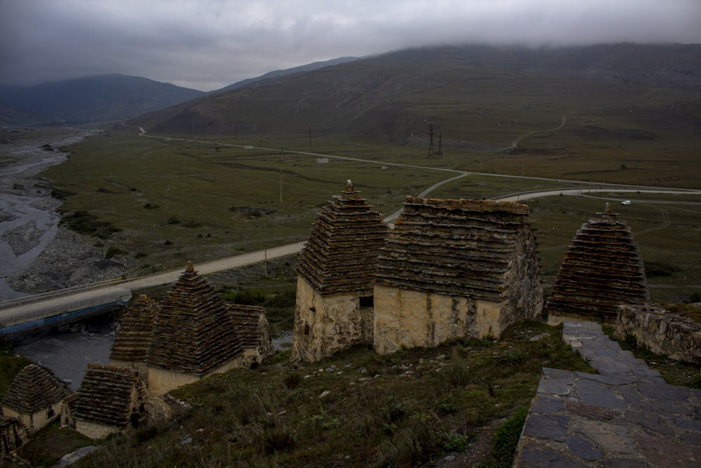 a group of buildings sitting on the side of a hill