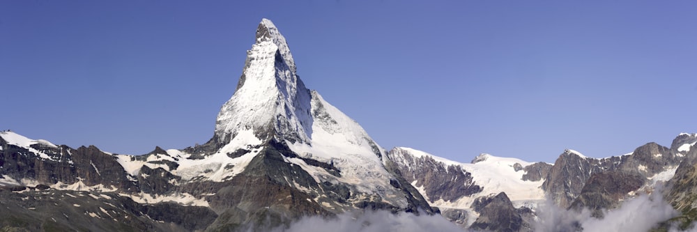 a very tall mountain with a lot of snow on top of it