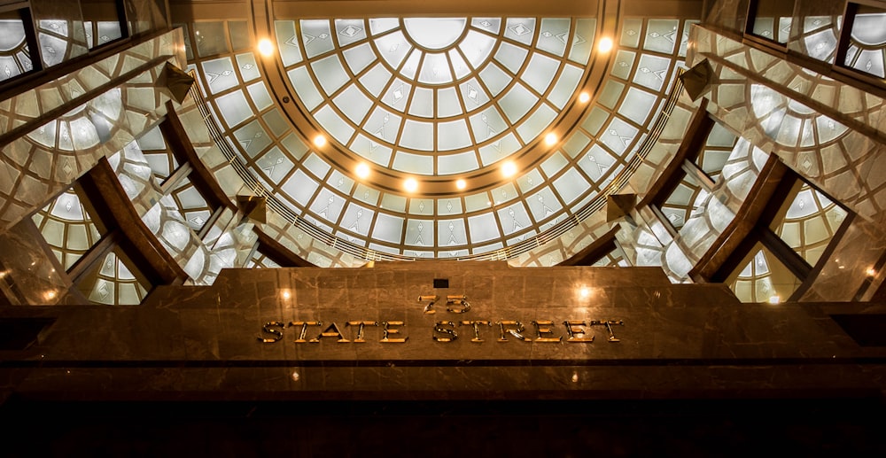 the entrance to a building with a glass dome