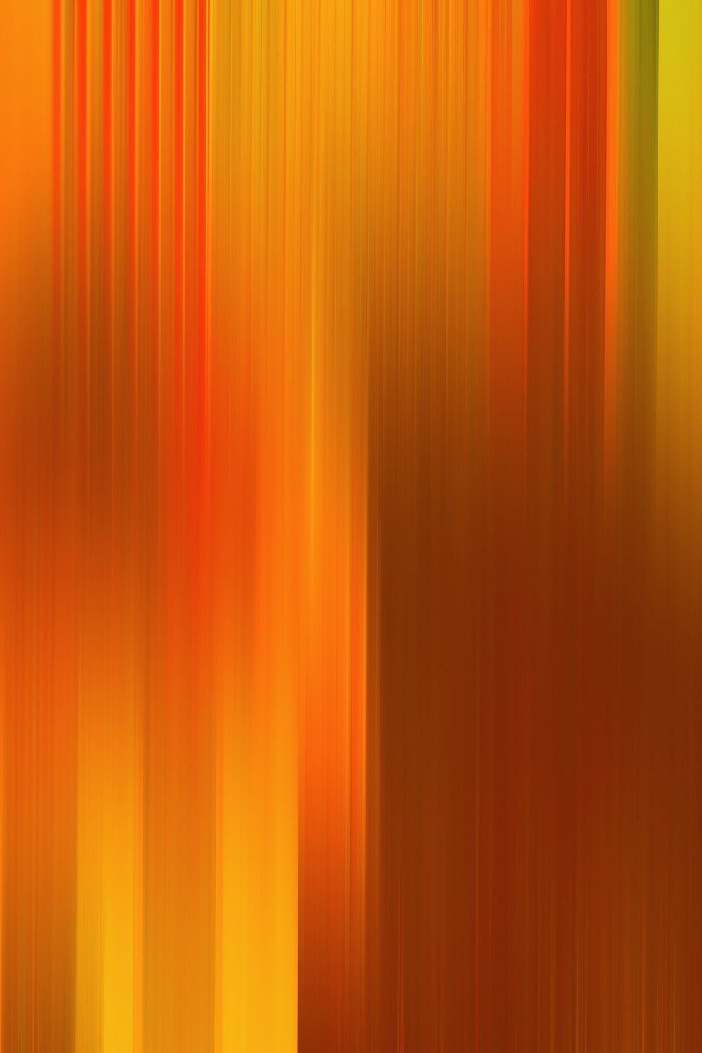 Ein verschwommenes Bild aus orangefarbenen und gelben Streifen