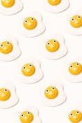 a group of eggs with faces drawn on them