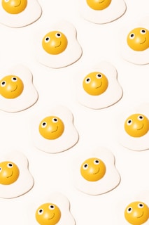 a group of eggs with faces drawn on them