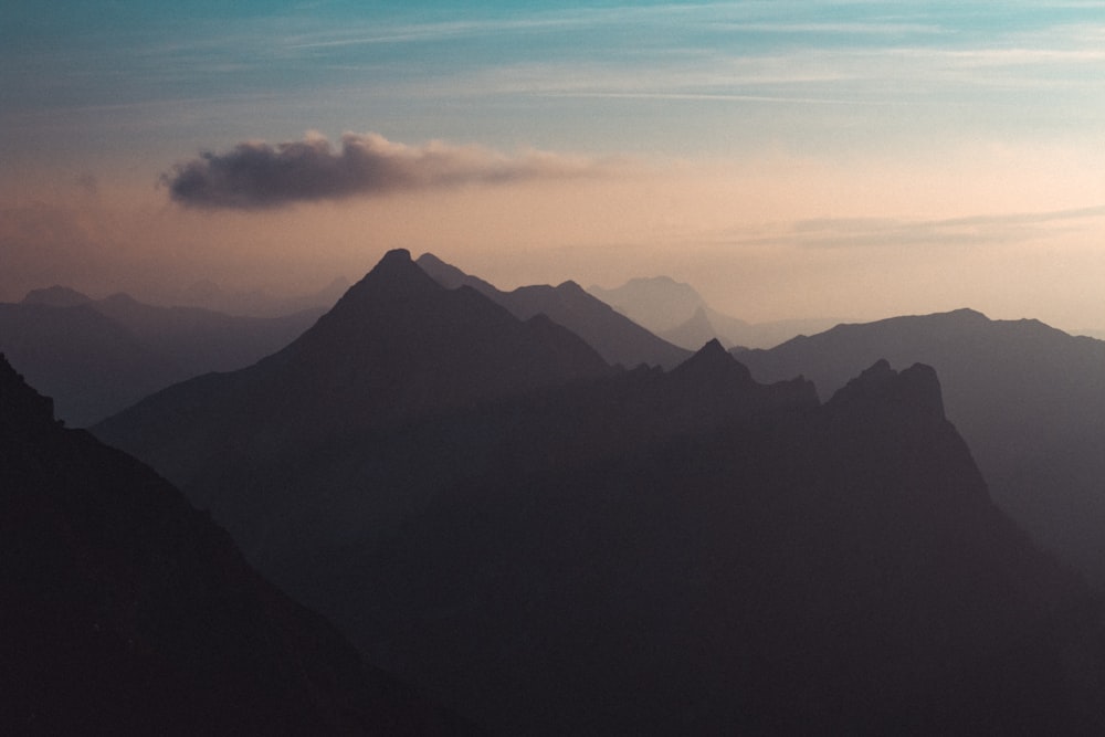 a view of a mountain range at sunset